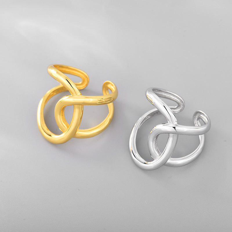 ANELLO REGOLABILE DOPPIA C A LINEE INTRECCIATE