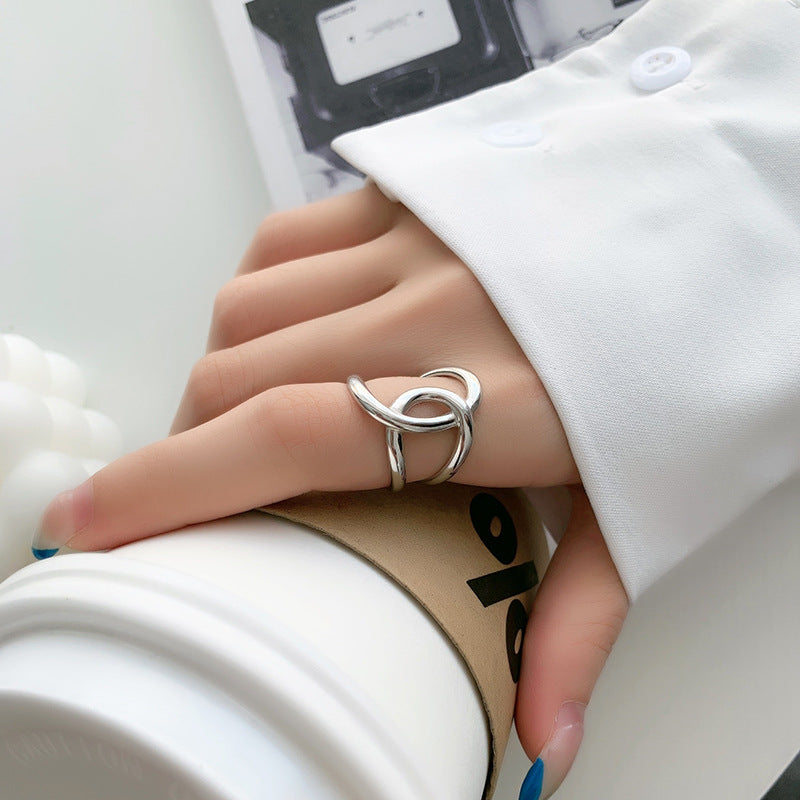 ANELLO REGOLABILE DOPPIA C A LINEE INTRECCIATE