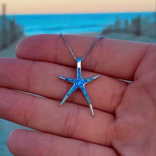 ANELLO A FASCIA CON GEMMA BRUMA DELL’OCEANO