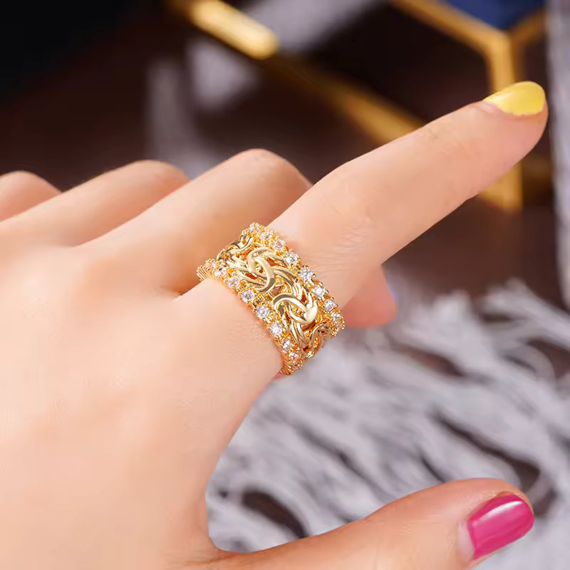 ANELLO INTRECCIATO DORATO CON ZIRCONIA