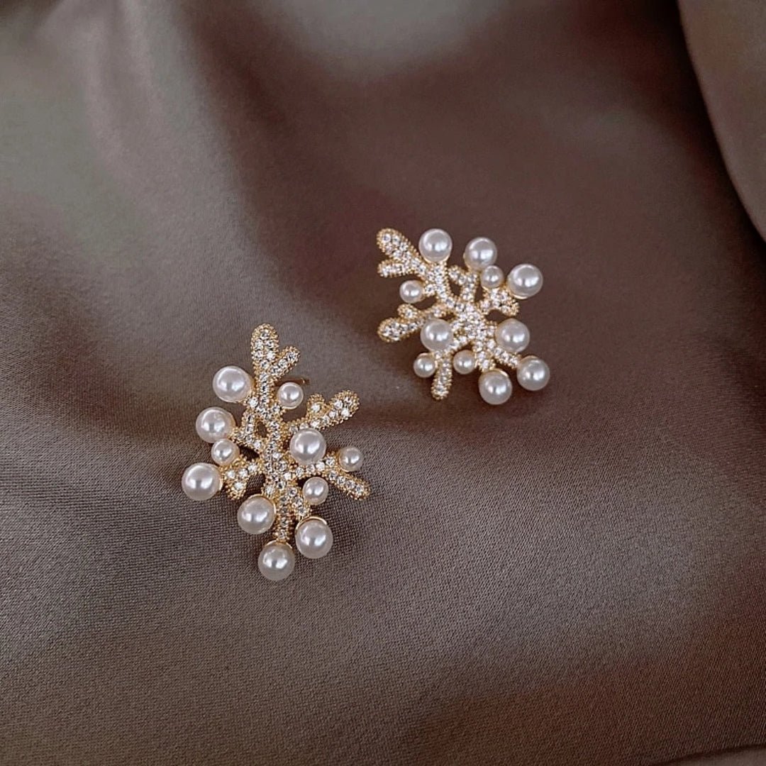 ORECCHINI DI PERLE FIORITURA CELESTE