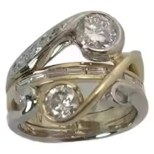 ANELLO DI LUSSO CON ZIRCONIA E METALLI MISTI