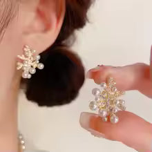 ORECCHINI DI PERLE FIORITURA CELESTE