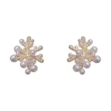 ORECCHINI DI PERLE FIORITURA CELESTE