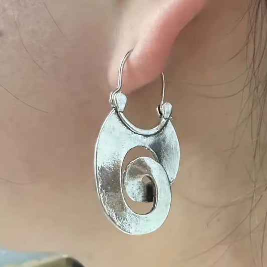 ORECCHINI PENDENTI A SPIRALE ORGANICA