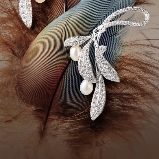 ORECCHINI IN ARGENTO STERLING A FORMA DI FOGLIE MORMORANTI CON PERLE