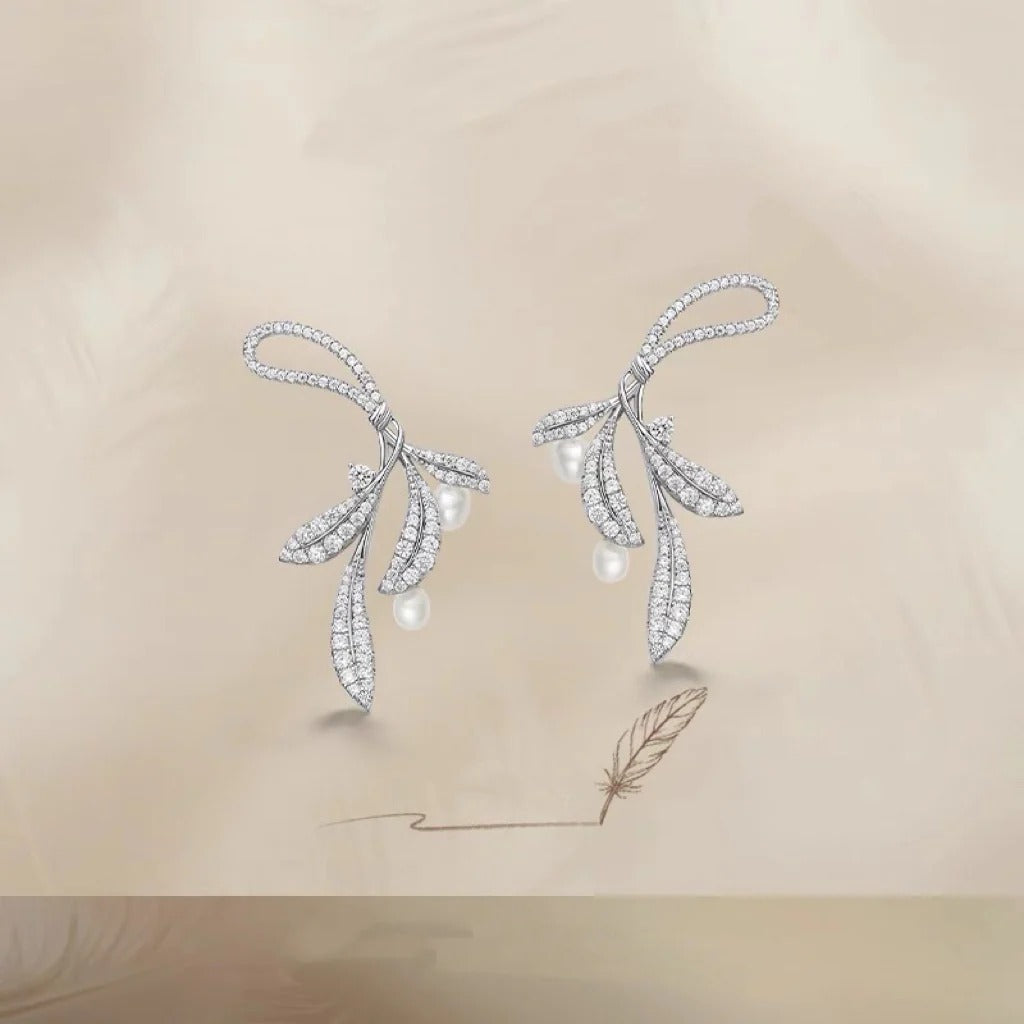 ORECCHINI IN ARGENTO STERLING A FORMA DI FOGLIE MORMORANTI CON PERLE