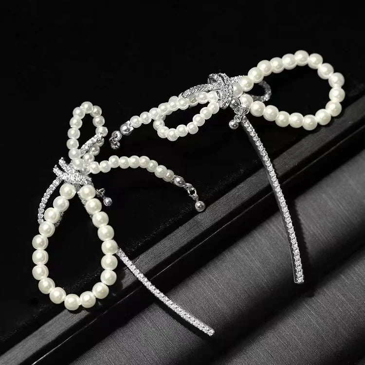 ORECCHINI IN ARGENTO STERLING CON PERLE E FIOCCO