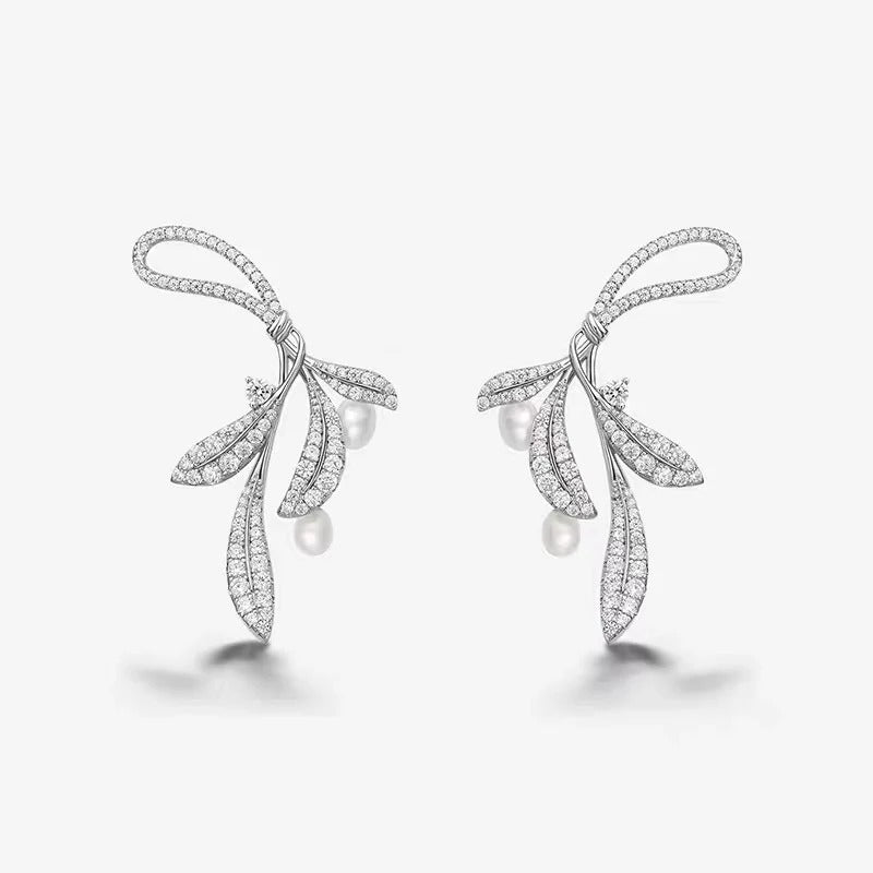 ORECCHINI IN ARGENTO STERLING A FORMA DI FOGLIE MORMORANTI CON PERLE