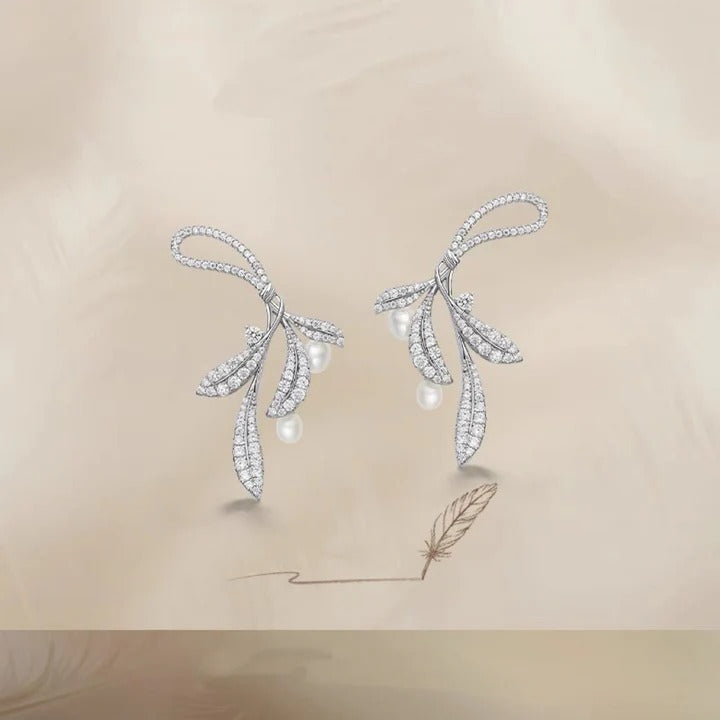 ORECCHINI IN ARGENTO STERLING A FORMA DI FOGLIE MORMORANTI CON PERLE