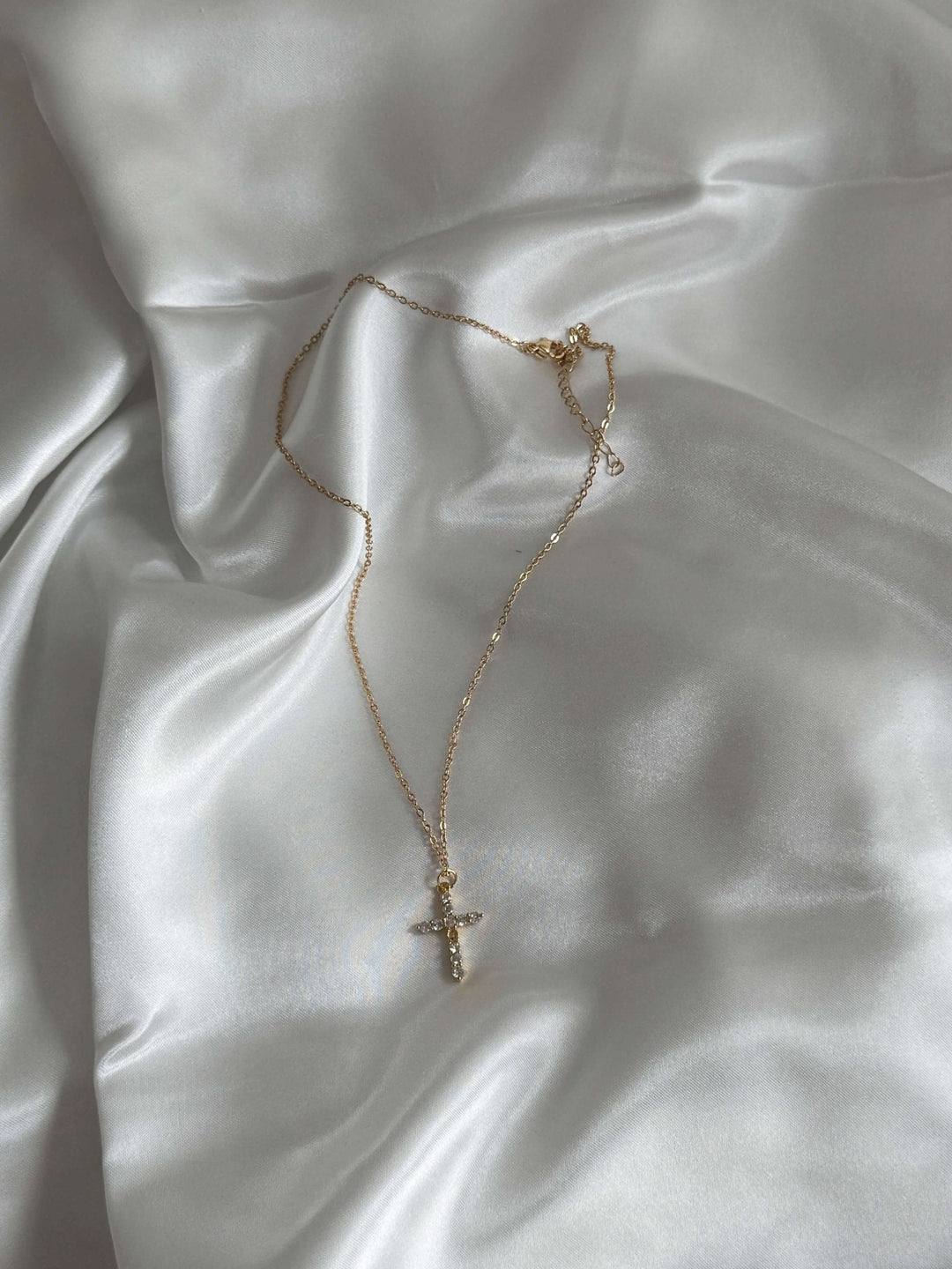 CIONDOLO CROCE DI LUCE CELESTE